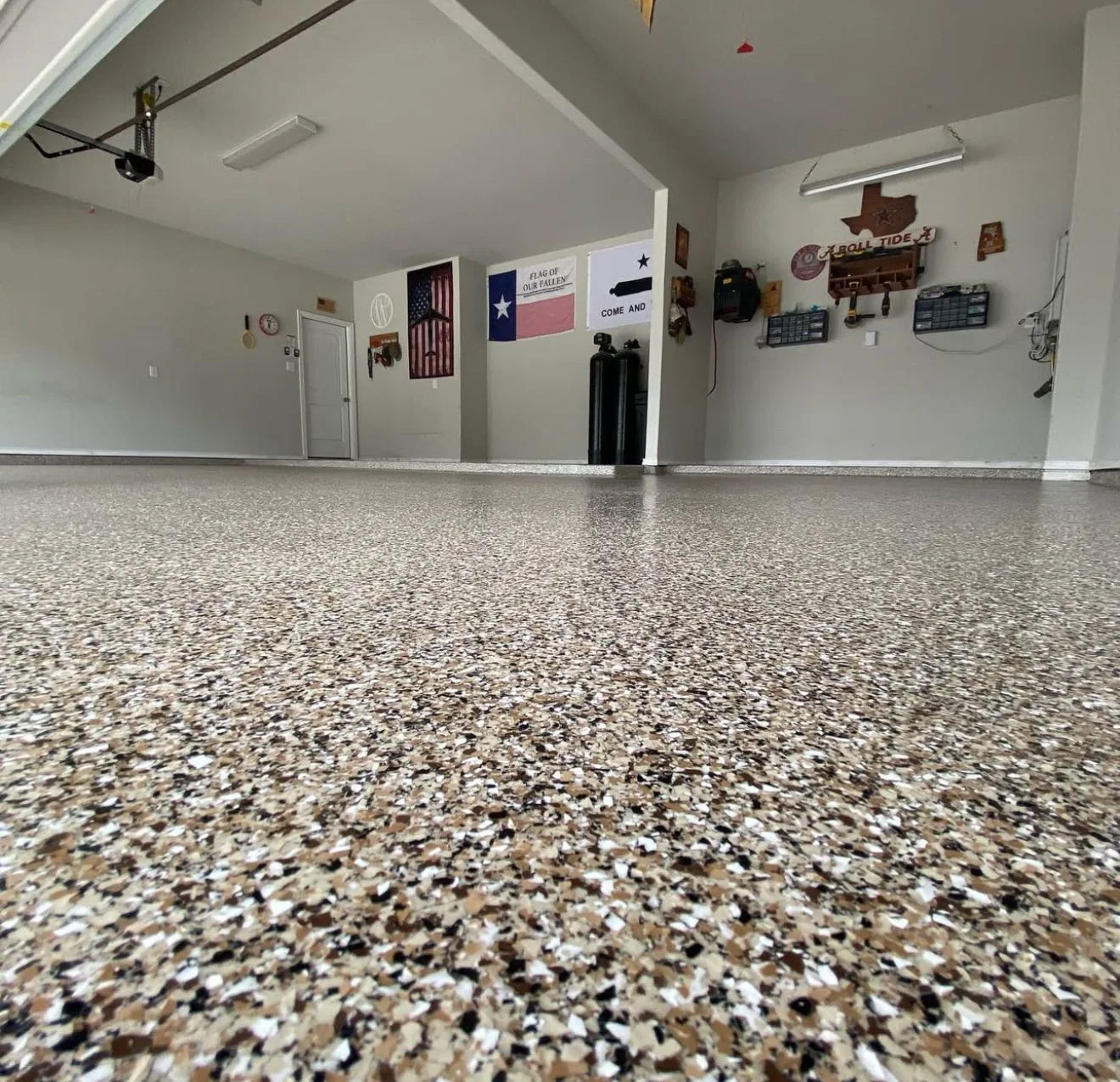 Tan, brown and white full-flake garage floor coating