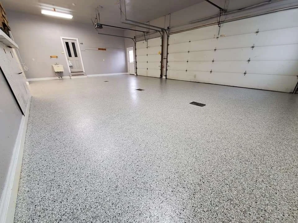 Finished gray flake garage floor with clear topcoat