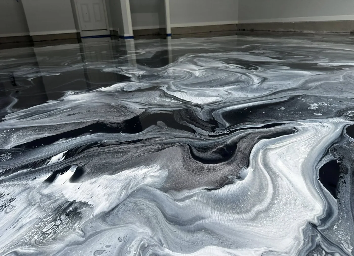 Black, silver and white metallic epoxy floor